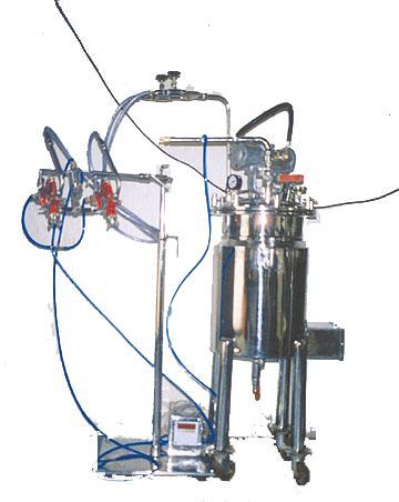 SPRAY COATING MACHINE. Used in the Pharmaceutical and Confectionary industry.