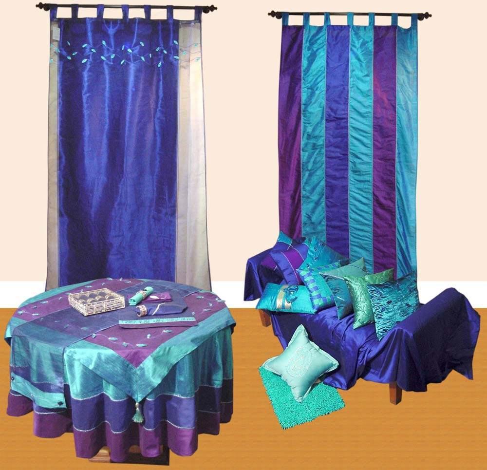 A Royal Blend of Colours in Curtains, Cushioncover, TableLinen Which Gives Your Home a Character.