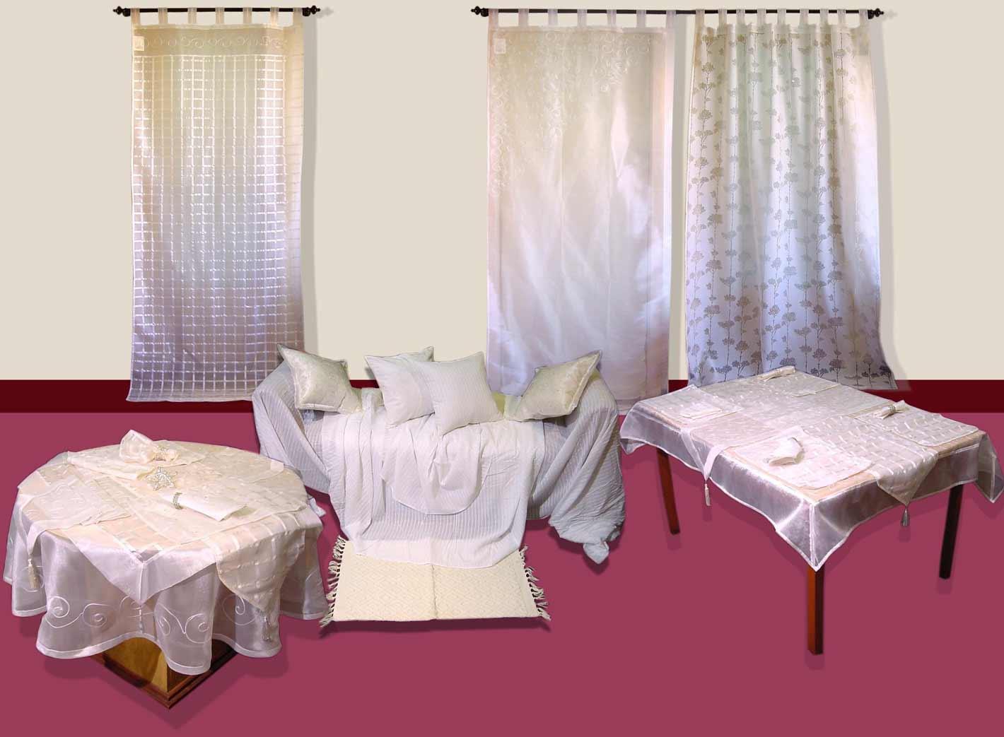 A range of Milky White fabric in Curtain , Cushion cover & Table Line to give a Prefect Coordination