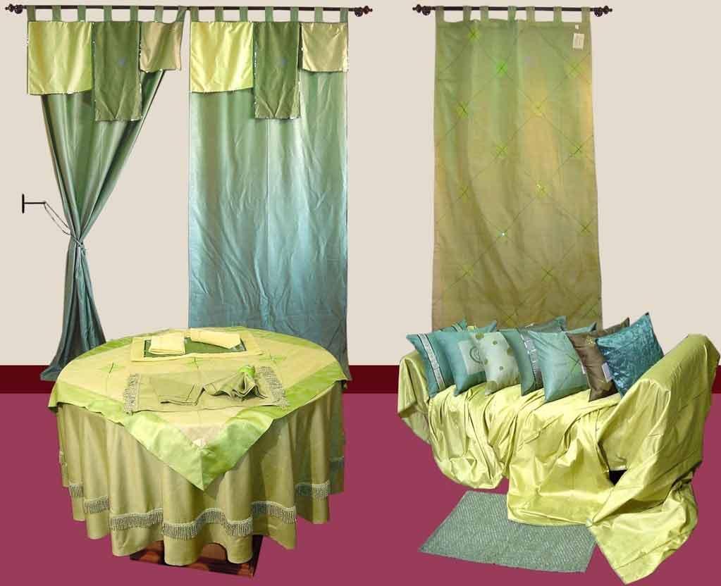A combination of cool colours in Curtains , Cushion cover & Tablelinen....