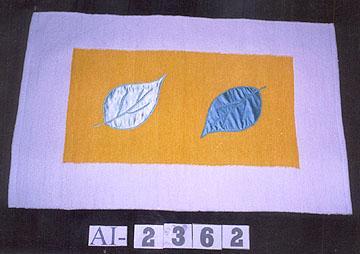 Cut Shuttle Chenille Pitloom Rug with Leaf Applique.