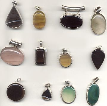 Silver pendants studded with semi precious cabachones