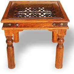 Wooden table with glass top