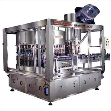 Gravity Filler Cum Cap Sealer