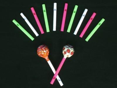 Whistle cum handle for sweet candy