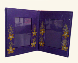 Handmade paper photo frame with dried flowers