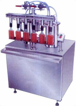 SEMI AUTOMATIC VACUUM FILLING MACHINE