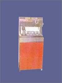 ग्लास भरने और सील करने की मशीनरी