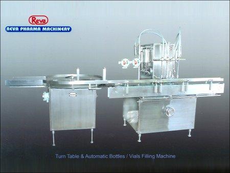 'Reva' Turn table & Automatic Bottles-Vials Filling Machine