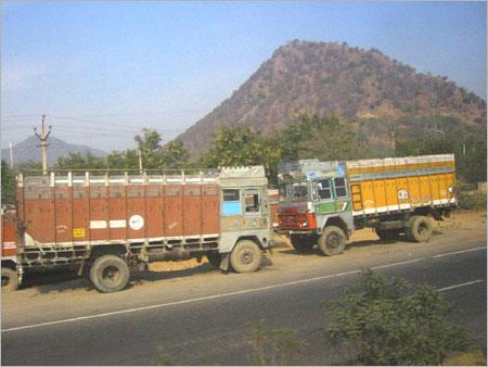 Trucks - Steel 10x4x3m Diesel Engine 2 Axles | Durable Build High Payload of 10 Tons Easy Maintenance Reliable Engine Safe Transport 12R22.5 Tires Manual Transmission