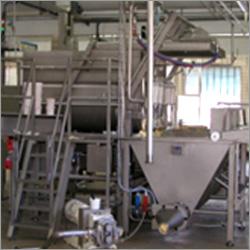 Mixer And Buffer Equipped With Transport Screws