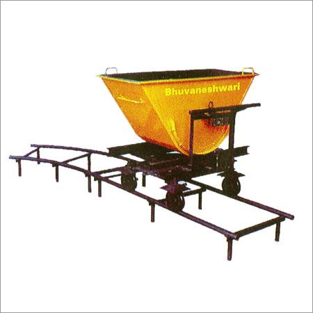 Tilting Bucket Rail Trollet System