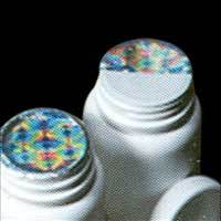 Holographic Induction Cap Seals