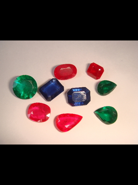 Emeralds, Ruby, and Blue Sapphire cut stones Emeralds, Ruby, and Blue Sapphire cut stones
