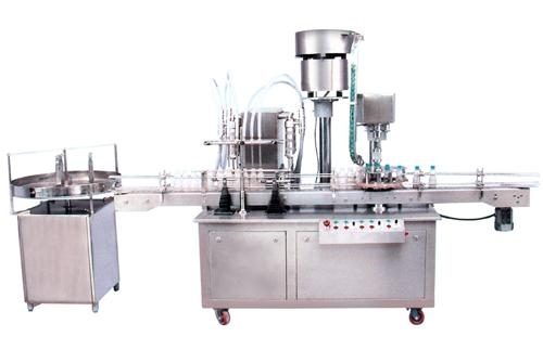 Fully automatic liquid filling and caping machine