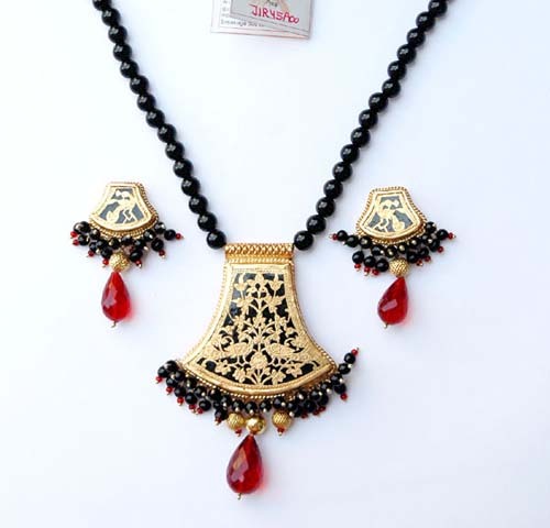 Thewa with gold casing