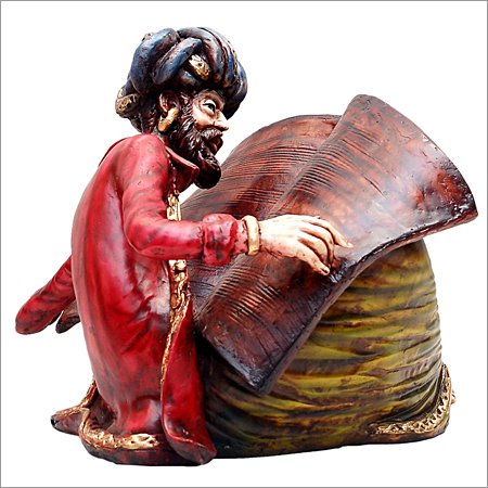 Statue of Man Reading