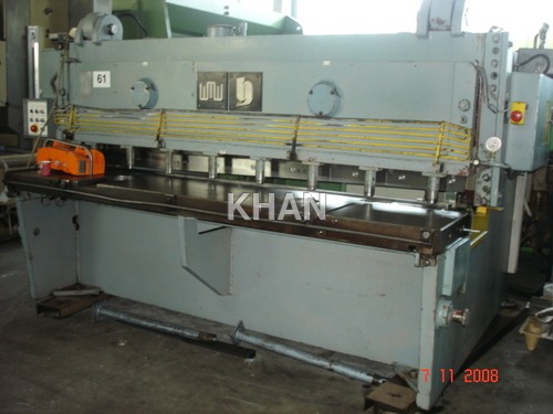 Sheet cutting machines