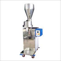 Volumetric Cup Filler Machine