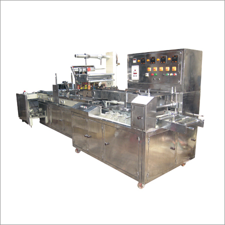 Family pack flow wrap machine