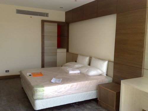 Hotel Interior - Wood & Fabric Materials, Beige, Variable Dimensions | Elegant Design, Customizable Functional Spaces, Luxury Feel
