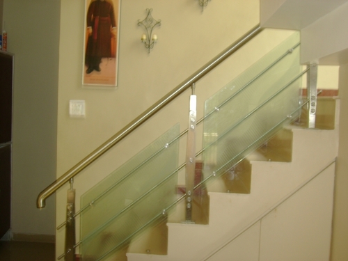 Staircase glass railing