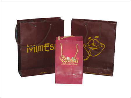 Carry Bags Printing - Paper, Variable Sizes, Glossy Brown Finish | Eco-Friendly, Custom Printing, Durable Material, Twisted Paper Handles