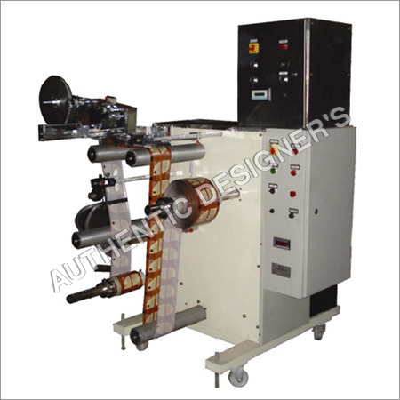 Rewinder Side Loading With Label Applicator