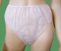 Female Panties - Non-woven, Free Size, Ivory White | Soft Material, Plain Design, Disposable For Beach And Hotel Use
