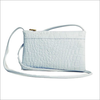 White Leather Ladies Designer Bags - Leather, White, Zipper Closure | Stylish Design, Adjustable Strap, Compact Size, Interior Compartments
