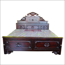 Carved Wooden Bed