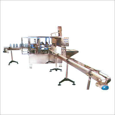 Bottle Rinsing Filling & Sealing Machine