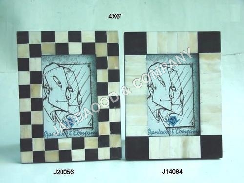 Photo frame with mosaic of bone