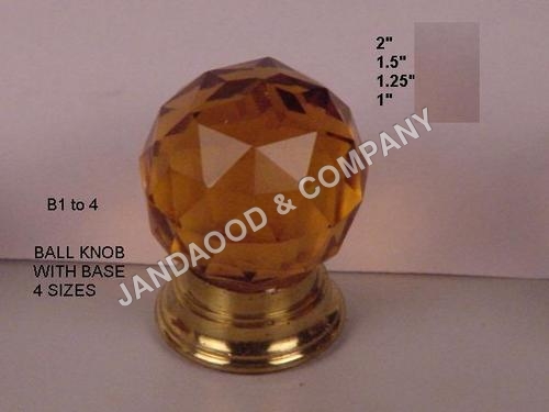 Glass knob on brass base