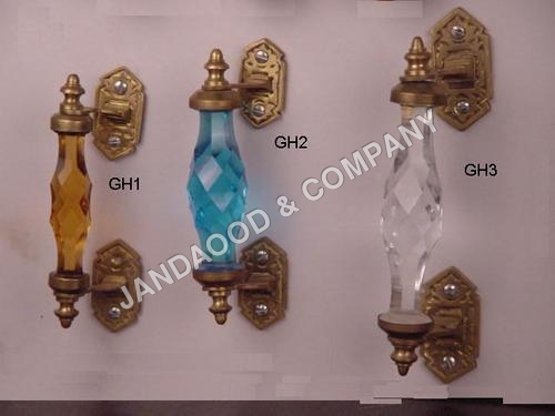 Glass handle with brass parts