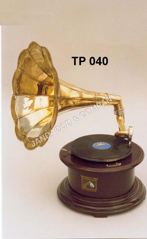 Gramophone with wooden base and brass horn