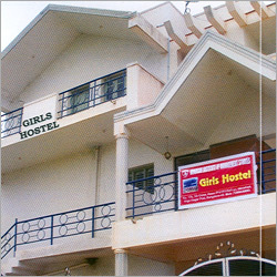 Girls Hostel - Concrete, Multi-Story Building, Rooms 100-200 sq ft | Kitchen, Laundry, CCTV, Gated, Shared Amenities