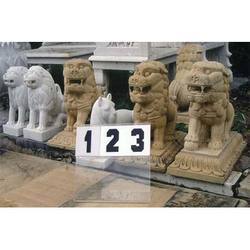 White And Brown Sandstone Lions