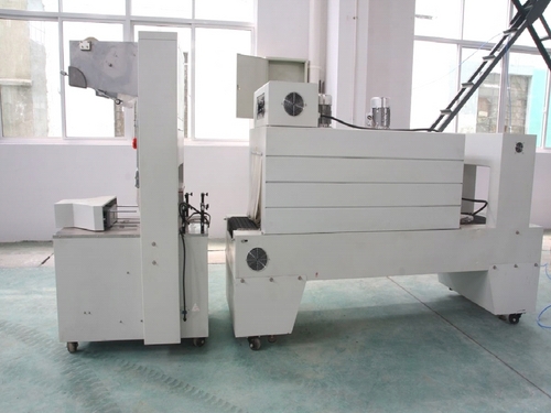 SEMI AUTOMATIC SHRINK WRAPPING MACHINE