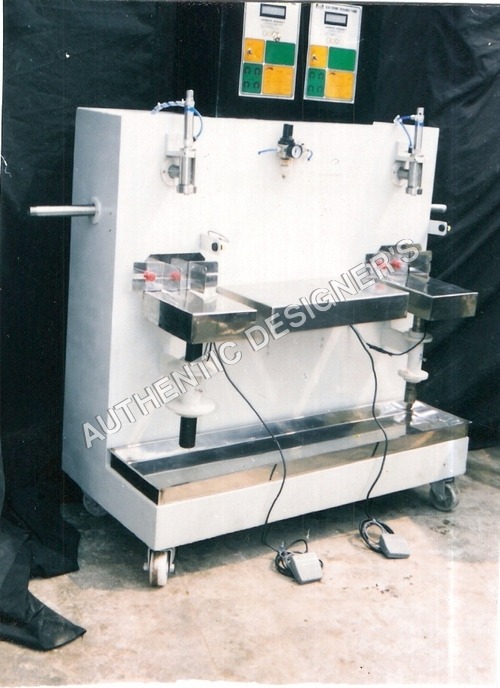 Semi Automatic Twin Head Liquid Filling Machine