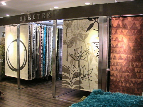 carpet display racks in steel with wooden finishing