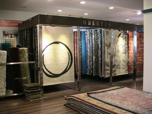 carpet display racks in steel with wooden finishing
