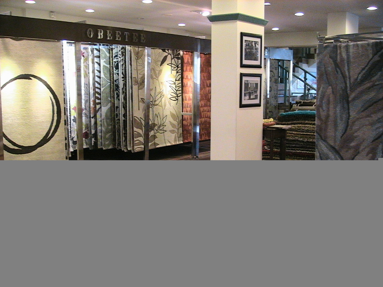 carpet display racks in steel with wooden finishing