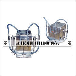 Silver Volumetric Liquid Filling Machine