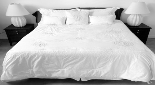 Bed with White Pillow & Bedsheet