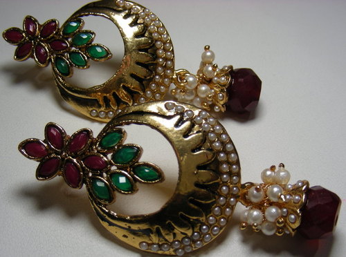 diamond earrings in antique work with ruby,fashion or costume jewelry,fancy earring