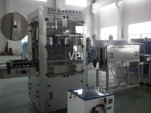 AUTO LABEL SLEEVING MACHINE