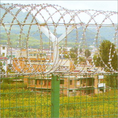 Concertina Coils On Mesh Fence