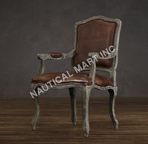 VINTAGE FRENCH CAMELBACK LEATHER ARMCHAIR By Nautical Mart Inc.