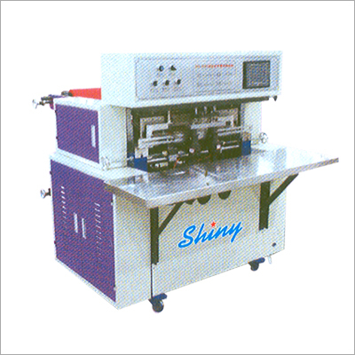 Handle Loop Attachment Machine